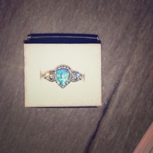 Size 7 blue ring. Never worn. New with box.